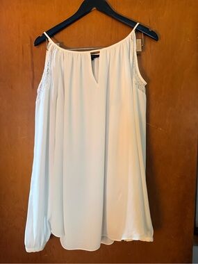 White House Black Market Cream Blouse with Soft Pleats one long sleeve arm